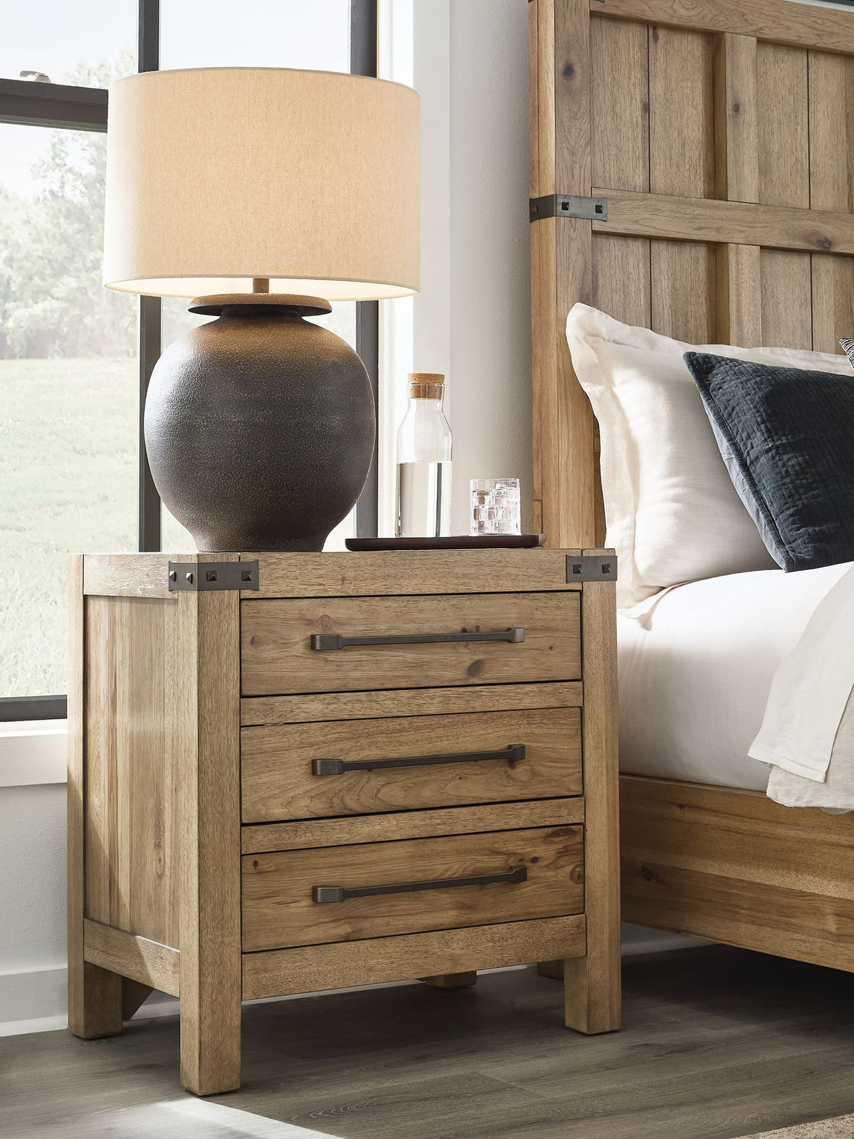 Ridgester - Three Drawer Night Stand - Light Brown