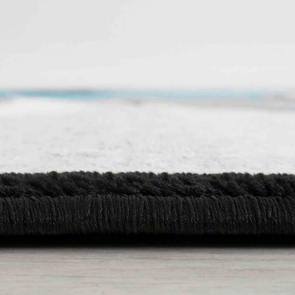 Niksar Turquoise Area Rug